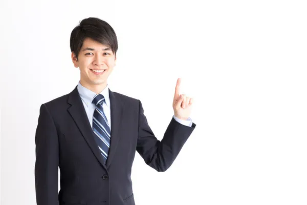 ポイントを指さすビジネスマン