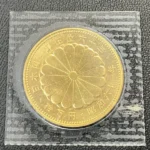 天皇陛下御在位60年記念 10万円金貨