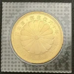 天皇陛下御在位60年記念 10万円金貨