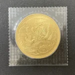 天皇陛下御在位60年記念 10万円金貨