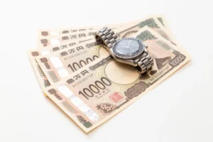 一万円札と腕時計