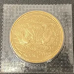 天皇陛下御在位60年記念 10万円金貨