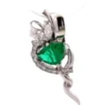 Pt900/K18WG エメラルド・ダイヤモンド ブローチ 1.36 ct 0.63 ct