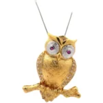 Pt900/K18 ダイヤモンド・ルビー ブローチ D0.24・R0.12 ct買取の参考価格