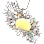 Pt･Pm900 オパール・ダイヤモンド ブローチ 6.92・0.7 ct