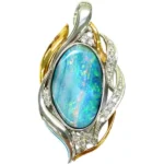 Pt900/K18[Ptﾒｲﾝ] ボルダーオパール・ダイヤモンド ブローチ 0.6ct