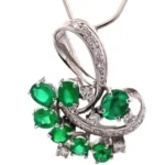 K18WG エメラルド・ダイヤモンド ブローチ 1.97・D0.33 ct