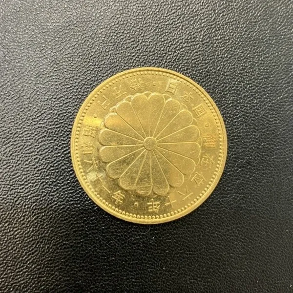 天皇陛下御在位60年記念硬貨