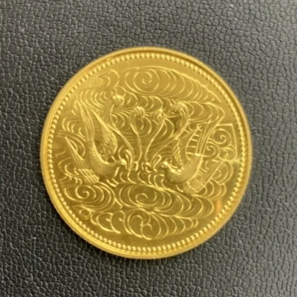 天皇陛下御在位60年記念10万円金貨