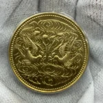 天皇陛下御在位60年記念10万円金貨