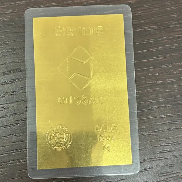 K24　ニッセイ創業100周年記念純金プレート