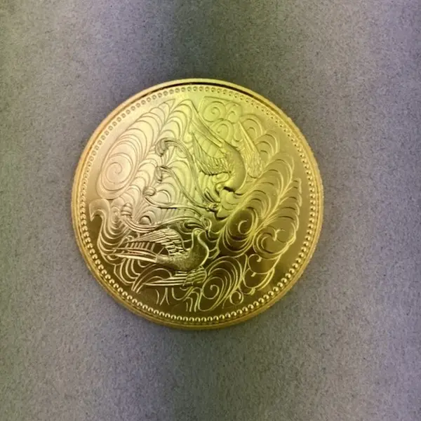 天皇陛下御在位60年記念10万円金貨
