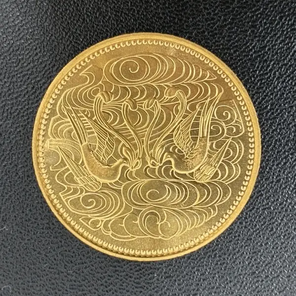 天皇陛下御在位60年記念10万円金貨