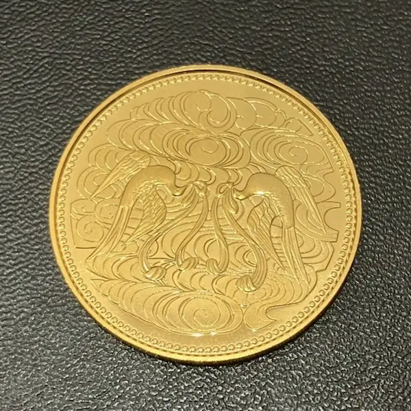 天皇陛下御在位60年記念10万円金貨