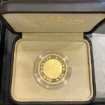 天皇陛下御在位60年記念10万円金貨