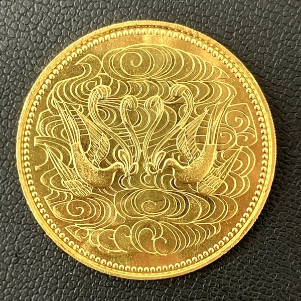 天皇陛下御在位60年記念10万円金貨