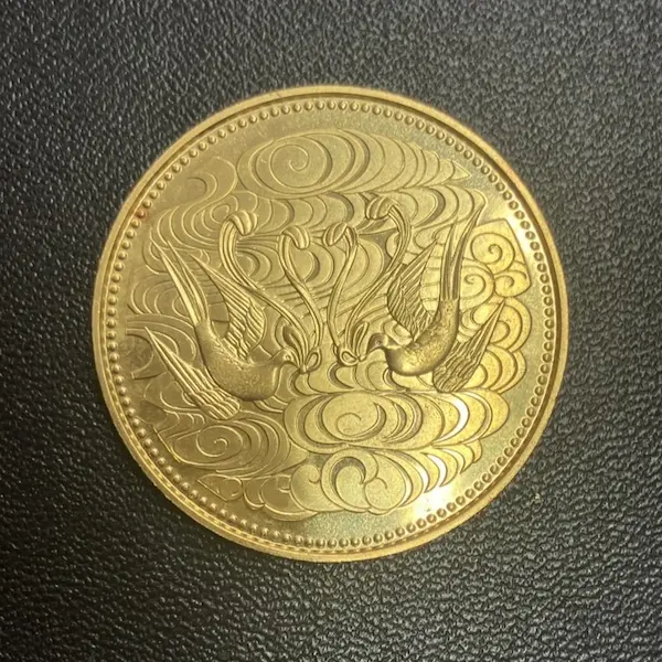 天皇陛下御在位60年記念10万円金貨