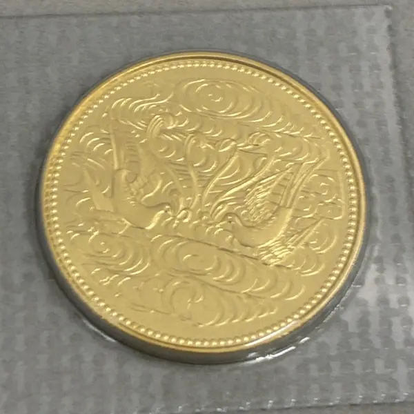 天皇陛下御在位60年記念10万円金貨