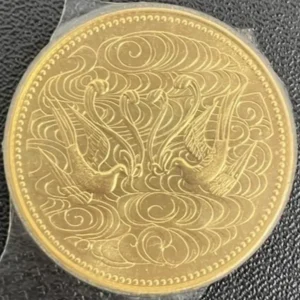 天皇陛下御在位60年記念10万円金貨