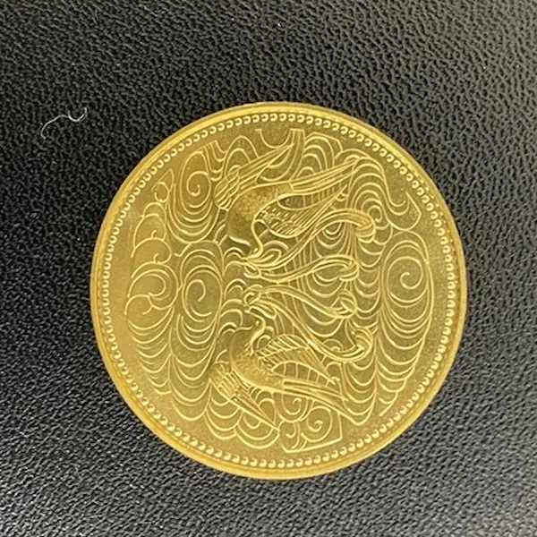 天皇陛下御在位60年記念10万円金貨