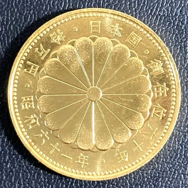 天皇陛下御在位60年記念10万円金貨