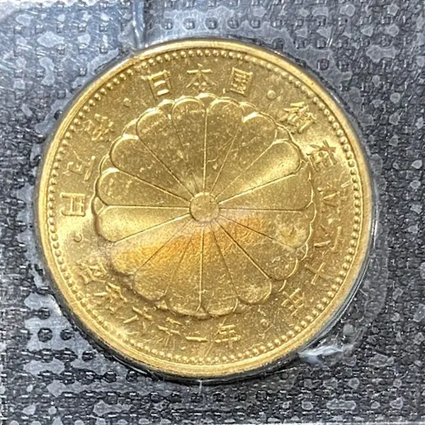 天皇陛下御在位60年記念10万円金貨