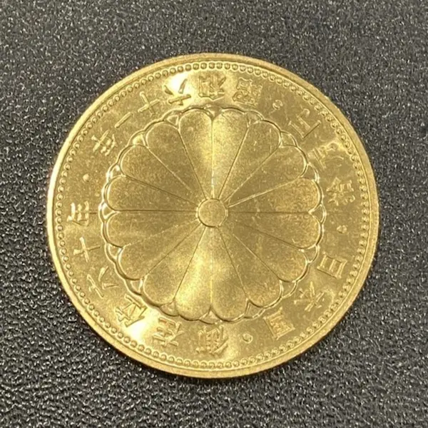 天皇陛下御在位60年記念10万円金貨