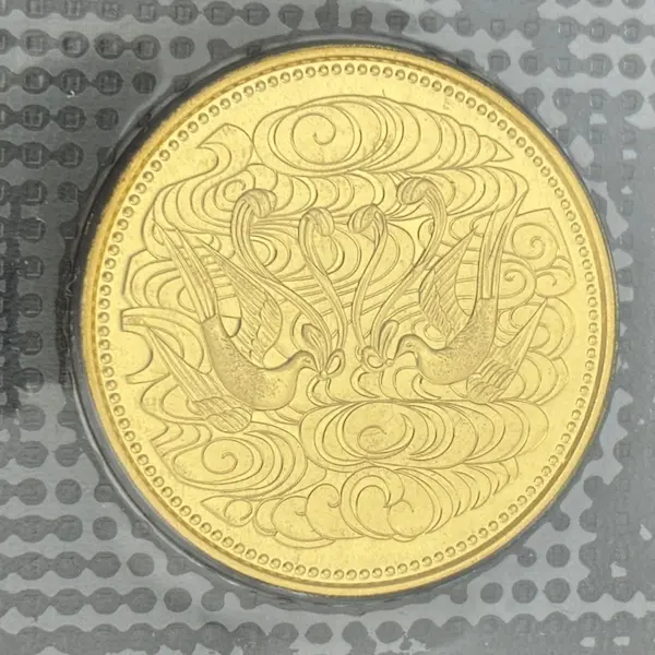 天皇陛下御在位60年記念10万円金貨