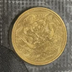 天皇陛下御在位60年記念10万円金貨