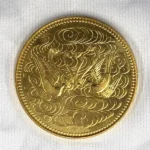 天皇陛下御在位60年記念10万円金貨