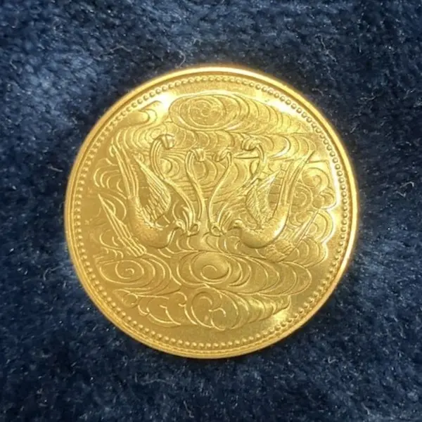 天皇陛下御在位60年記念10万円金貨