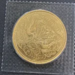 天皇陛下御在位60年記念10万円金貨