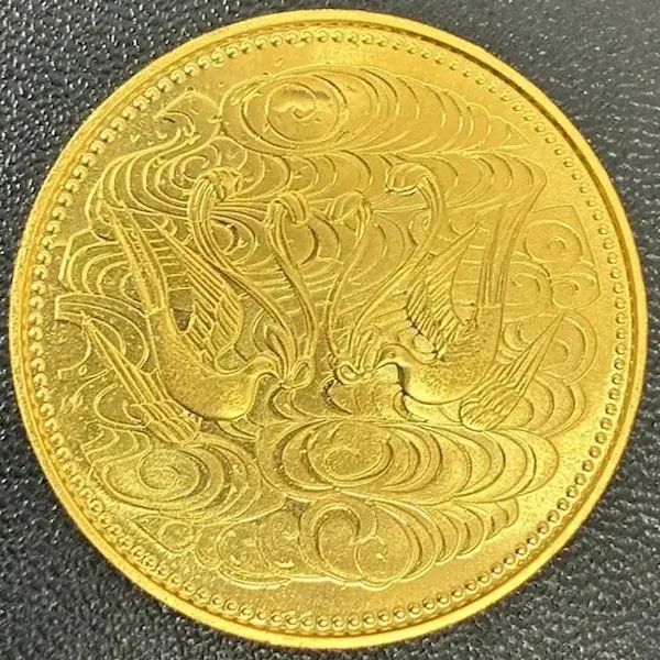 天皇陛下御在位60年記念10万円金貨