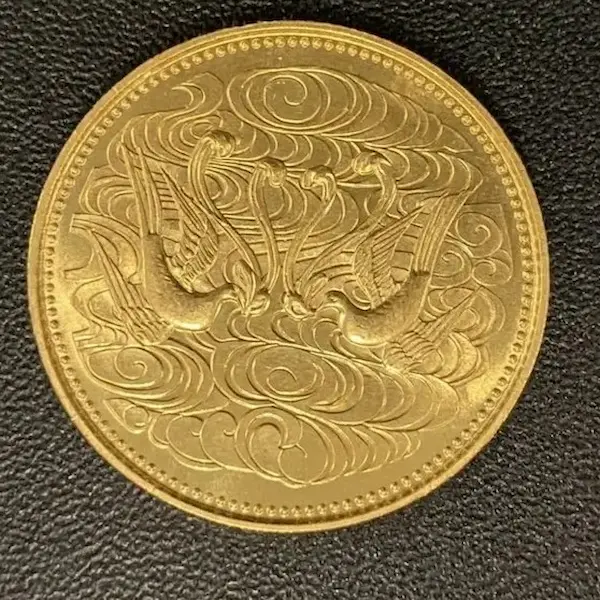天皇陛下御在位60年記念10万円金貨