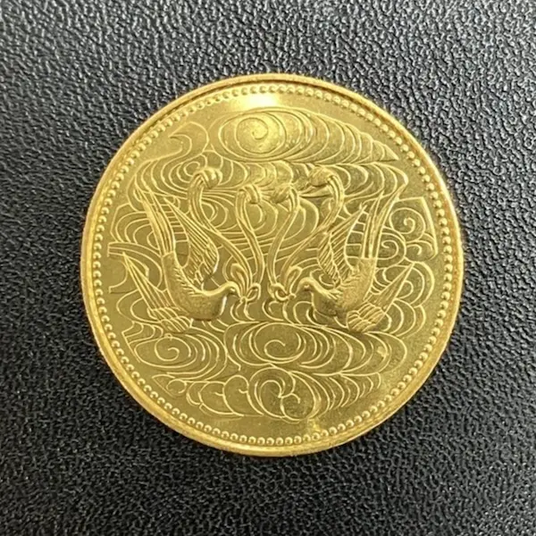 天皇陛下御在位60年記念10万円金貨