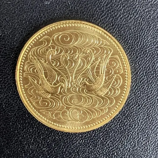 天皇陛下御在位60年記念10万円金貨