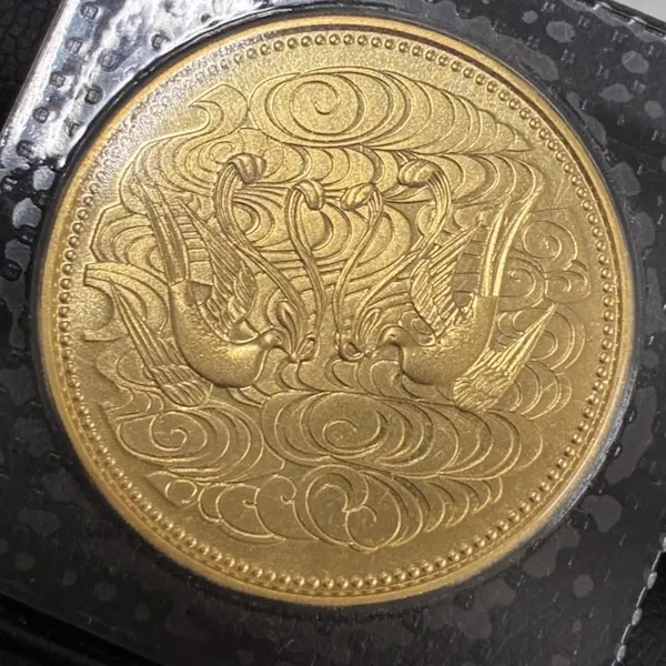 天皇陛下御在位60年記念10万円金貨