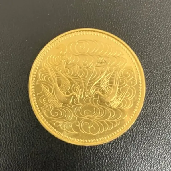 天皇陛下御在位60年記念10万円金貨