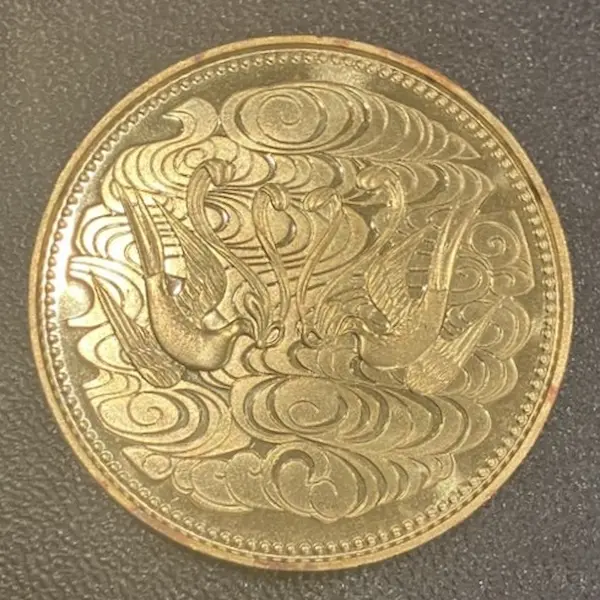 天皇陛下御在位60年記念10万円金貨