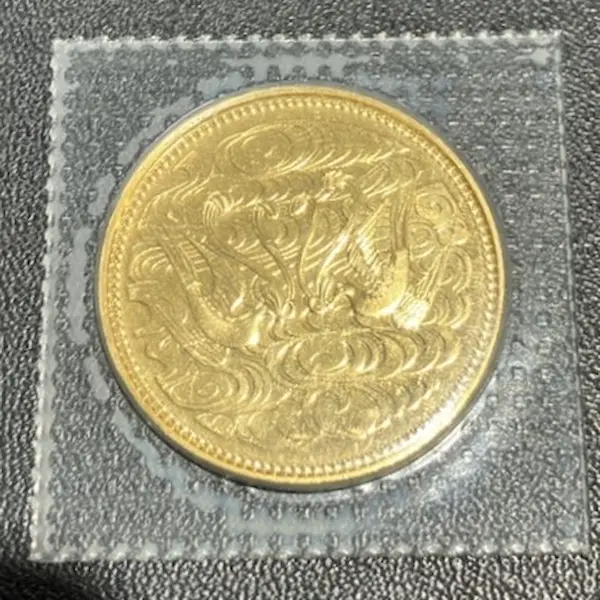 天皇陛下御在位60年記念10万円金貨