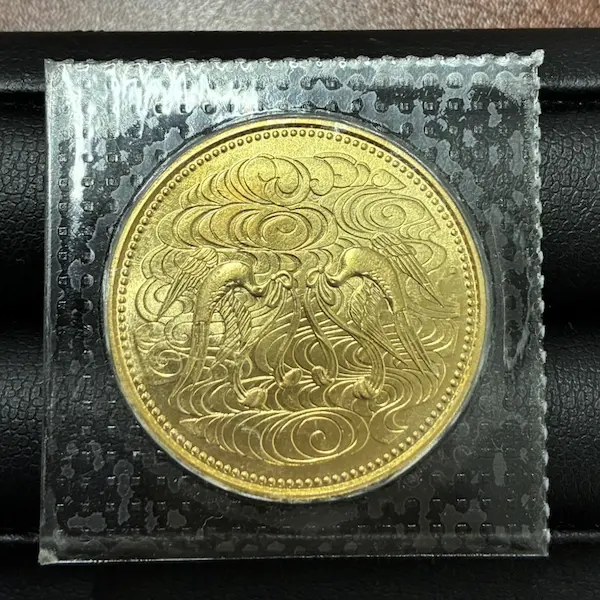 天皇陛下御在位60年記念10万円金貨