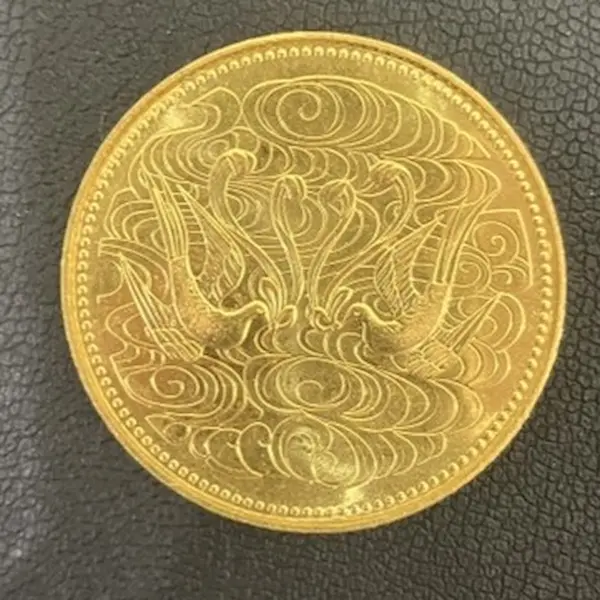 天皇陛下御在位60年記念10万円金貨