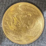 天皇陛下御在位60年記念10万円金貨