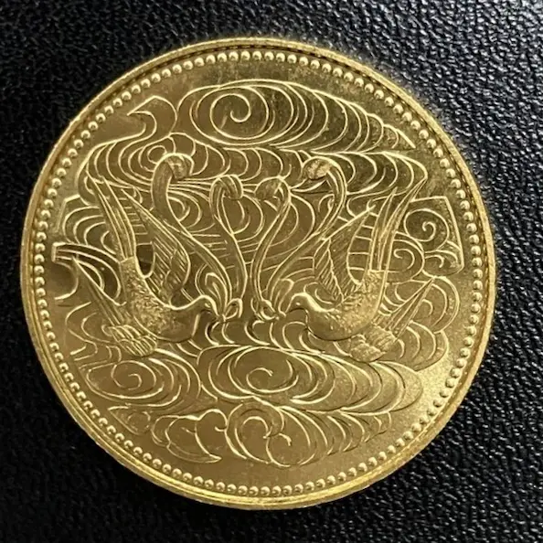 天皇陛下御在位60年記念10万円金貨