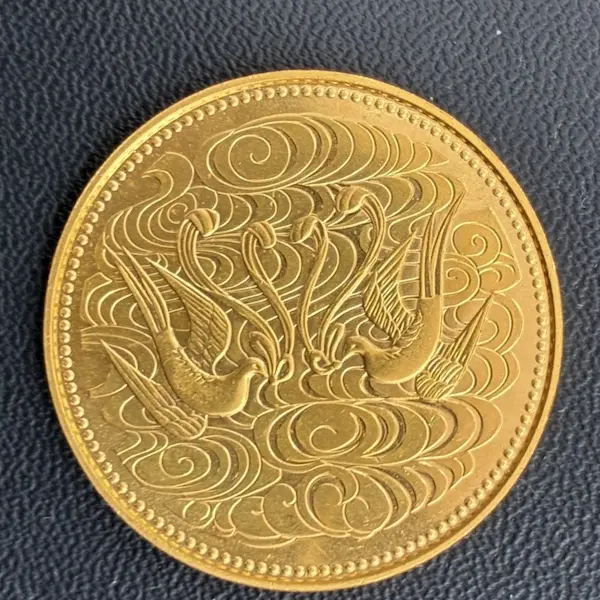 天皇陛下御在位60年記念10万円金貨