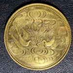 天皇陛下御在位60年記念10万円金貨