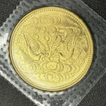 天皇陛下御在位60年記念10万円金貨
